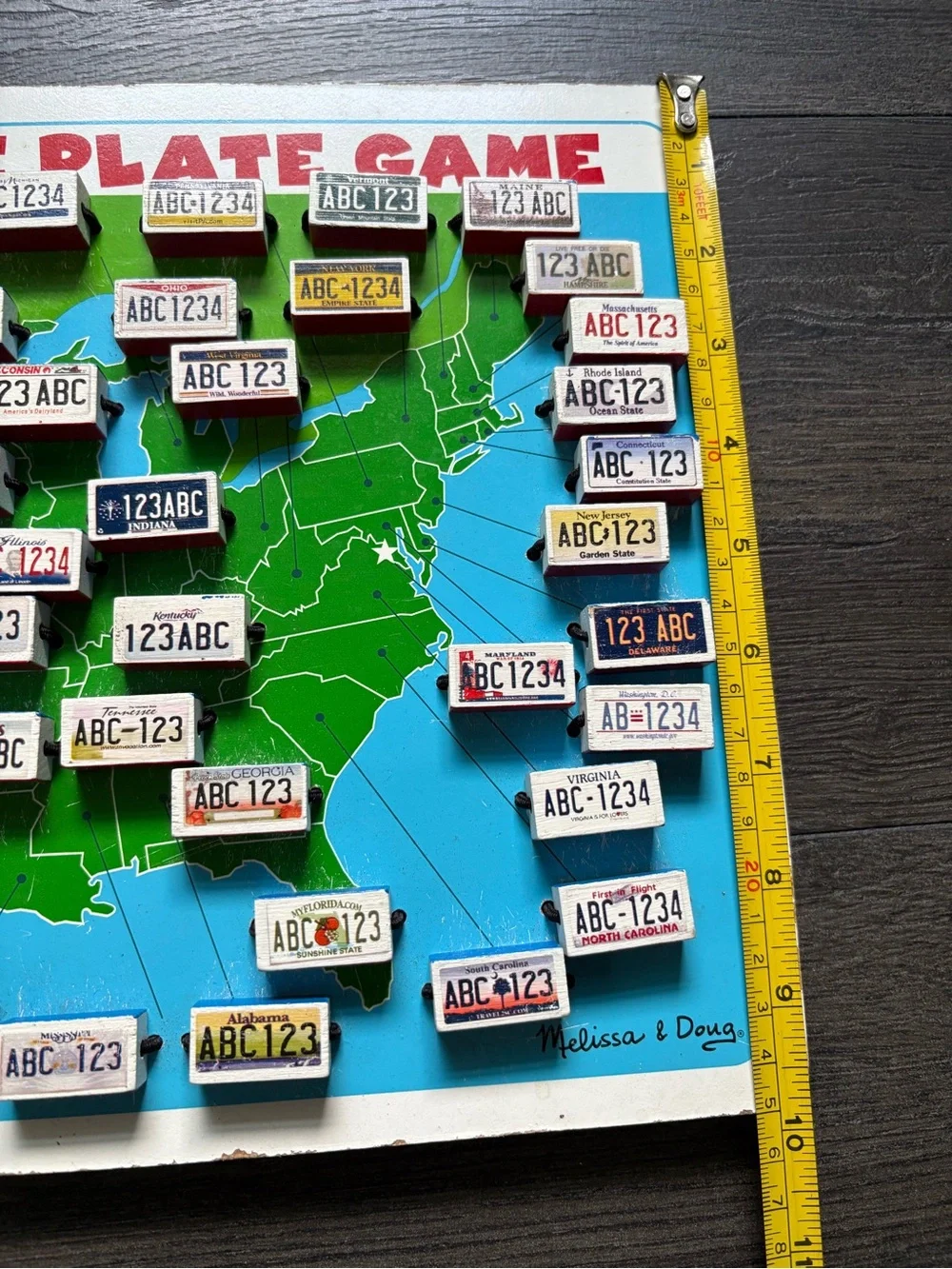 Melissa & Doug Wooden USA License Plate Car Travel Flip Game 14.5 x10 Inch Board